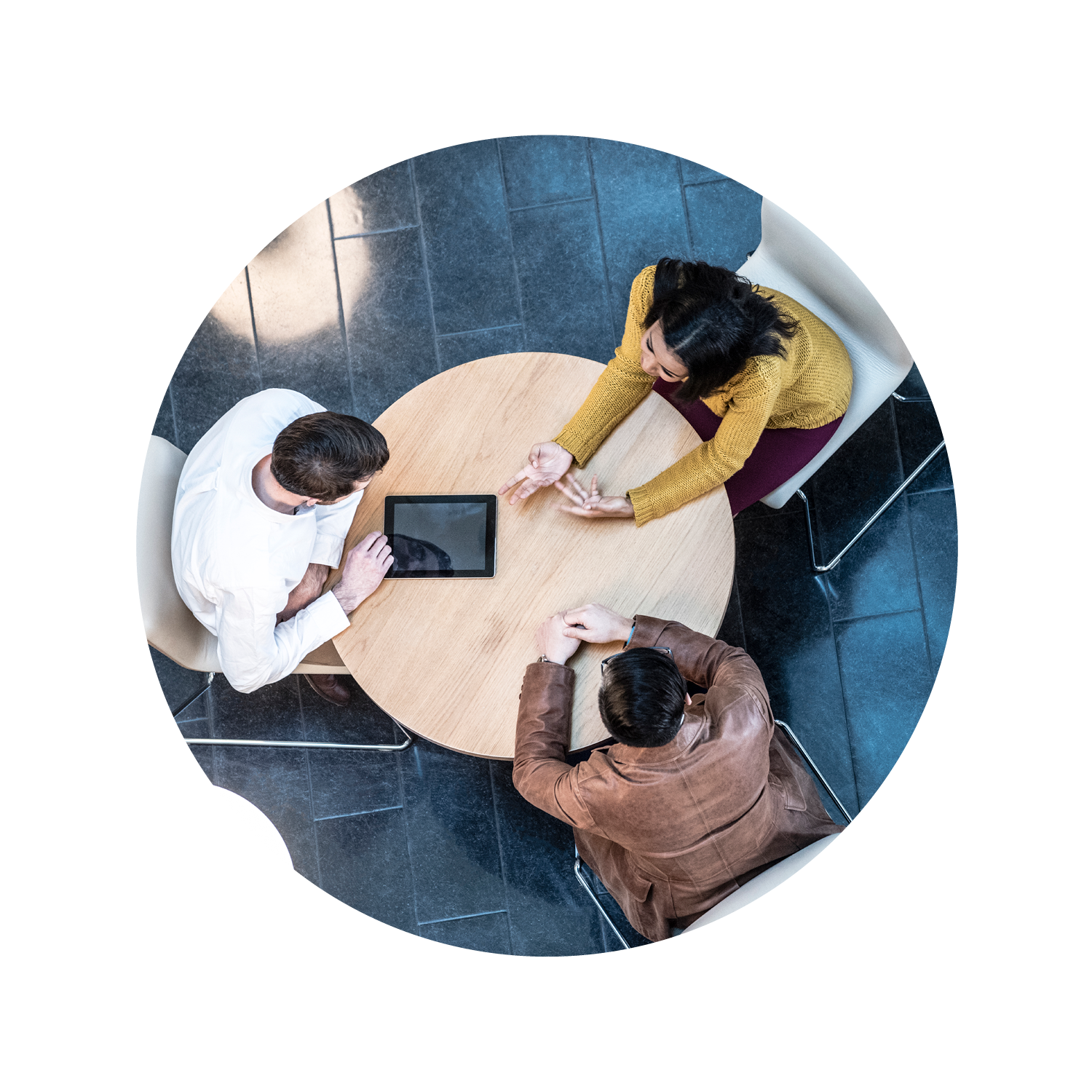 overhead view of employees engaged in conversation