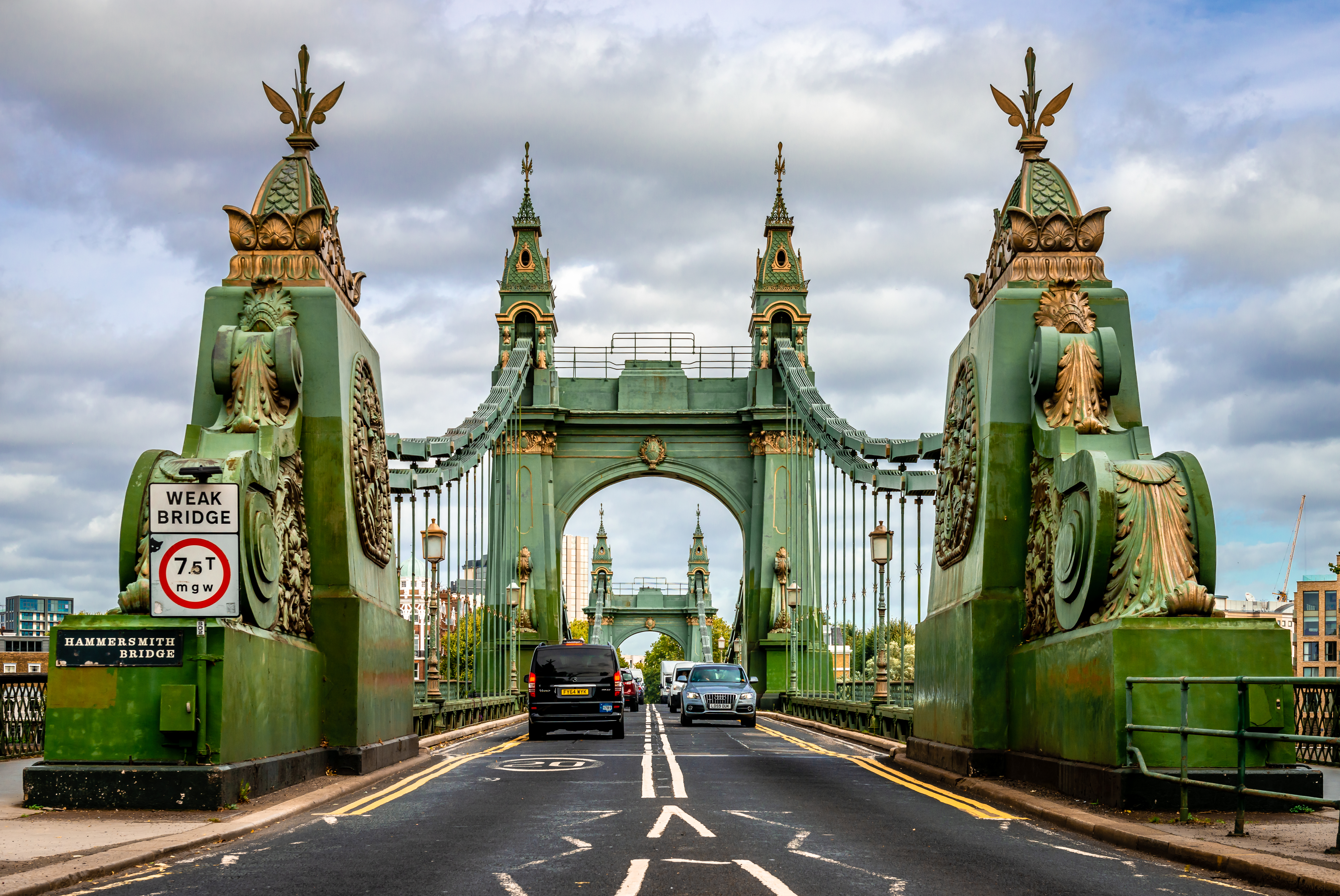 Hammersmith Bridge is a suspension bridge that also enables pedestrians and cyclists to cross between Hammersmith and Barnes, on the south side of the river. It is Grade II* listed. Photo taken from Barnes.