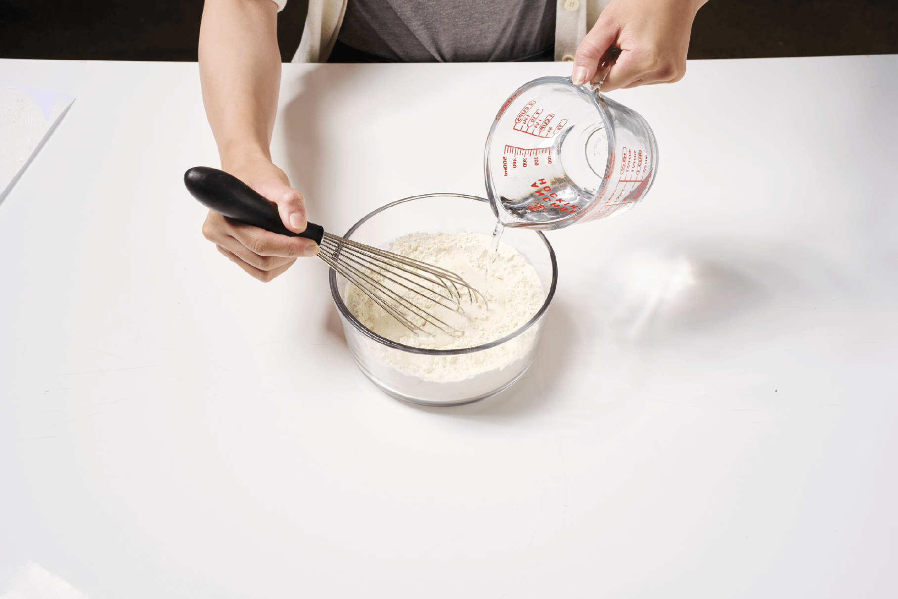Large Bowl with Wet and Dry Batter Being Mixed In