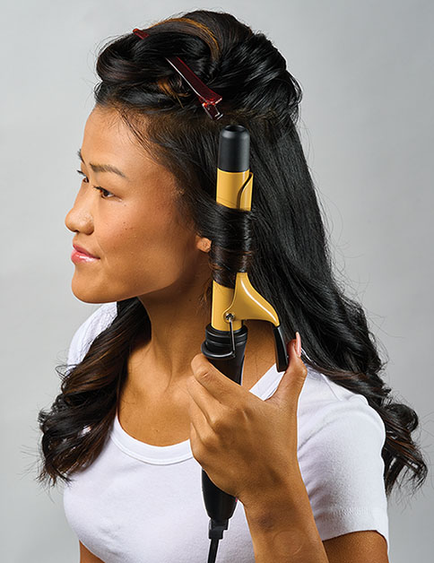 A woman preforming the Curl step.