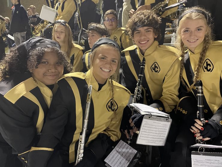 African businesswoman showing good statistics report explaining deal advantages convincing multiracial partners at negotiations meeting, black manager consulting diverse clients promising benefits