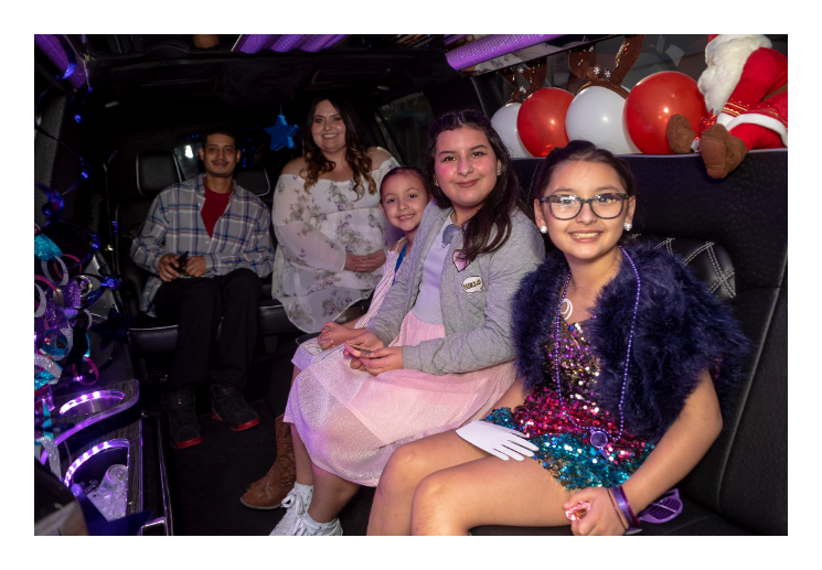 Kaylin and her friends and family receiving VIP treatment in a special limo on the way to her performance.