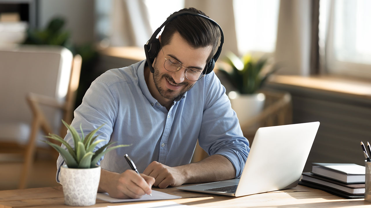 Image of man working on laptop