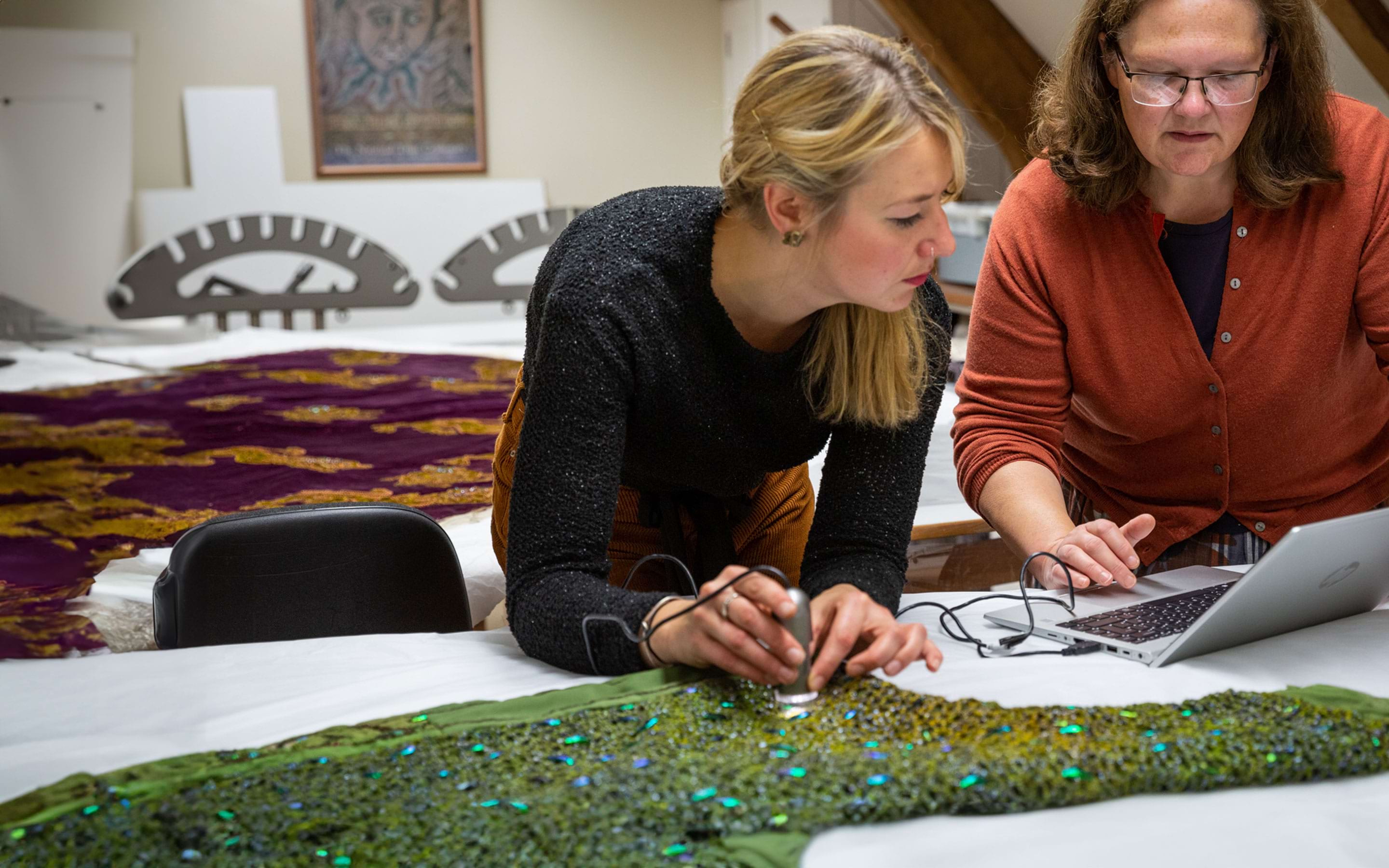 Using a digital microscope to inspect the Beetlewing dress (CMS 1118839.1) from Smallhythe Place at the Textile Conservation Studio, Norfolk