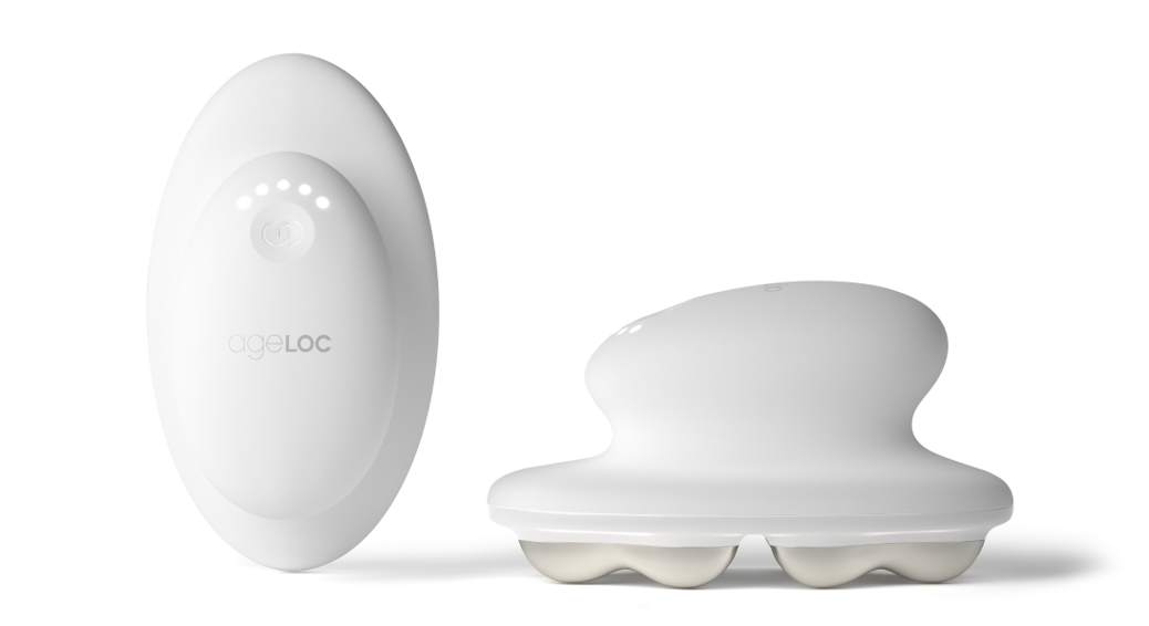 A display of the WellSpa iO showing the top and side views of the device on a white backdrop.