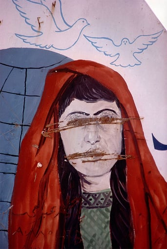 painting of woman on wall