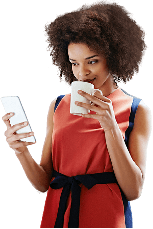 Woman drinking coffee and checking her phone
